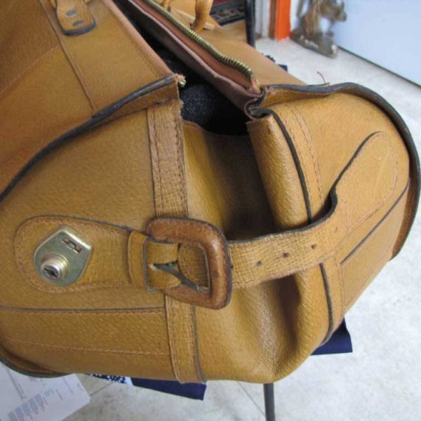 My mom’s selling a beautiful duffel bag on eBay