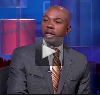 Greg Anthony wearing a suit with two breast pockets